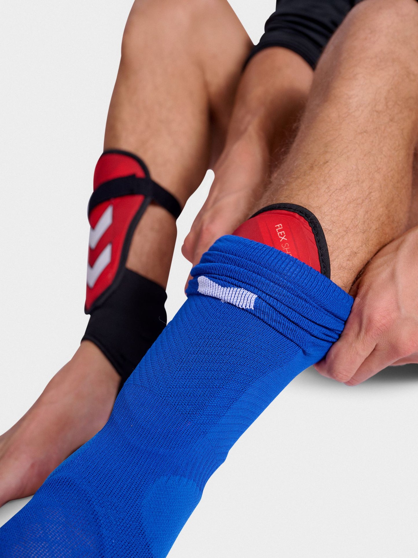 HMLSHIN GUARDS FLEX SHELL